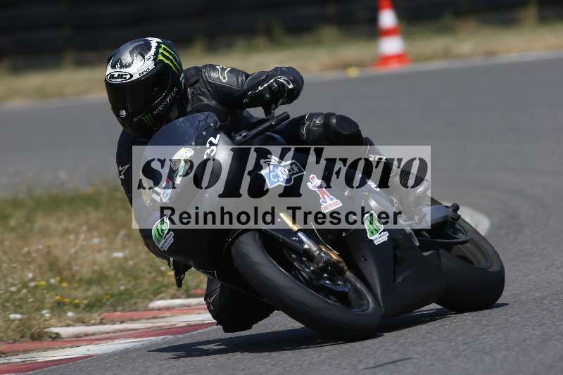 /Archiv-2023/28 05.06.2023 Moto Club Anneau du Rhin/vert-medium/1